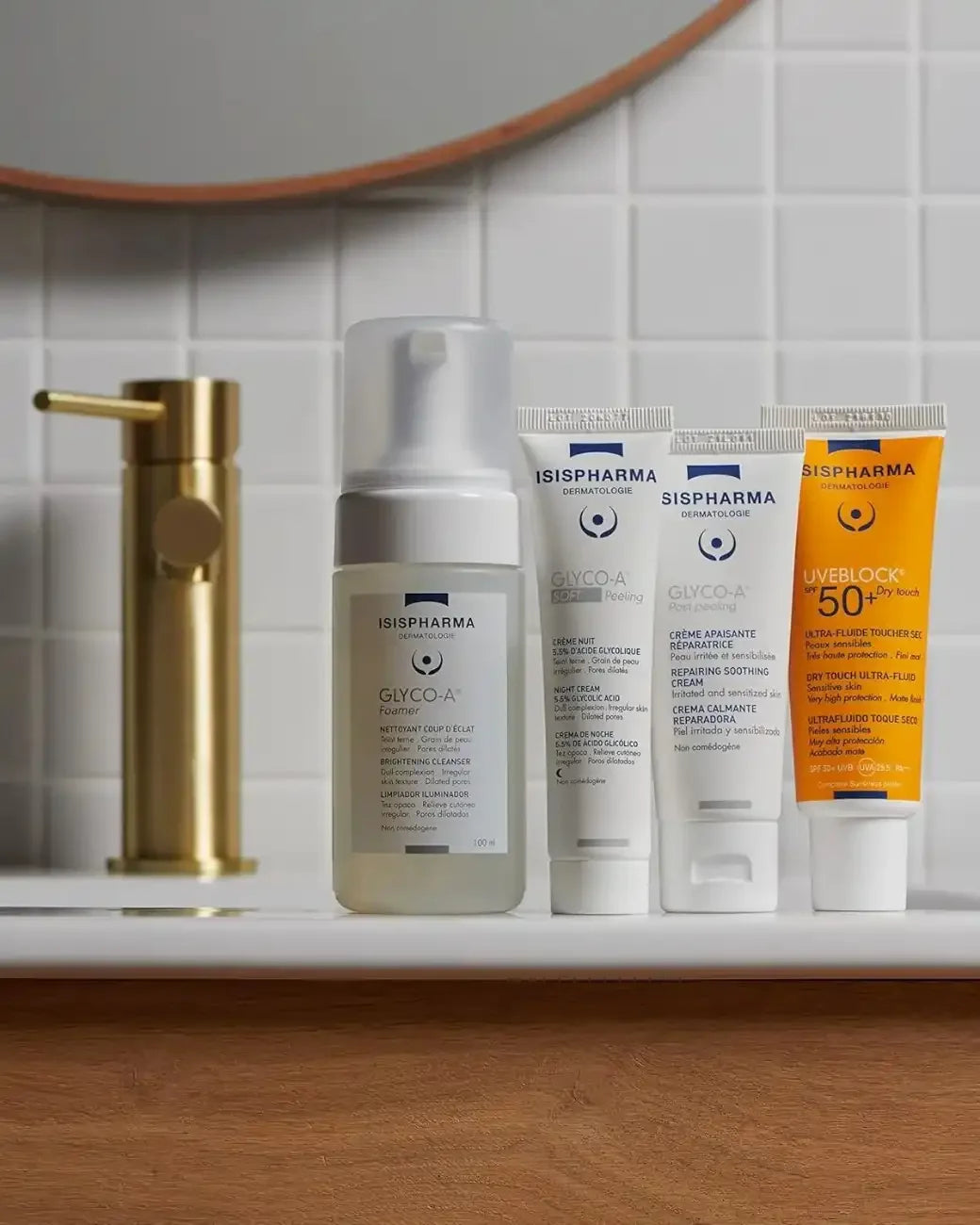 Sis Pharma skincare products on a bathroom counter with a mirror